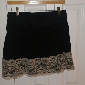 Black skirt with creamy white lace